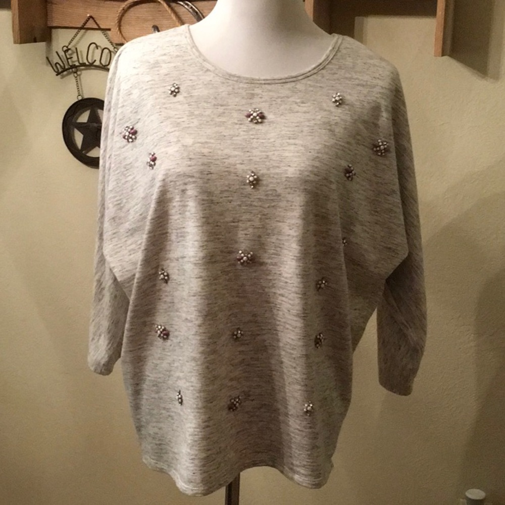 Jeweled front light sweatshirt.